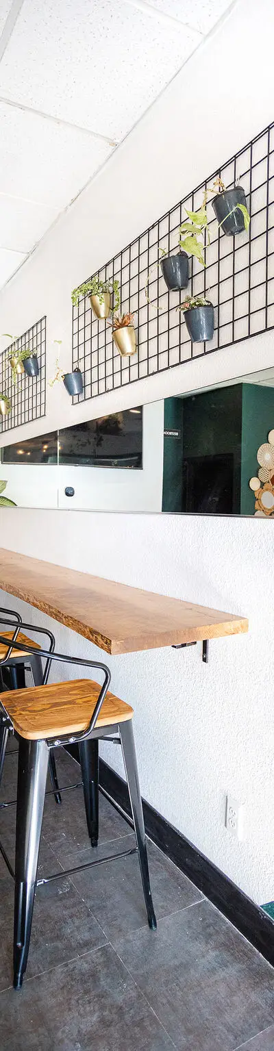 The Nook bar-height seating with plant wall in Folsom, CA